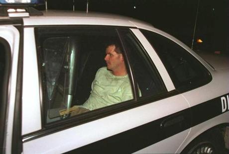 SOUTH ATTLEBORO, MA-- Arthur L. ( Butchie) Doe is escorted back to prison after escaping from a Central Falls, Rhode Island prison. 2/11/96.
